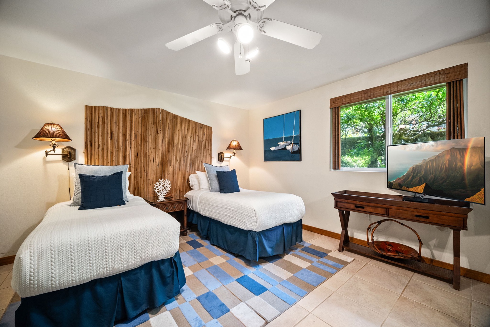 Drift off to restful sleep in crisp, cozy bedding with bamboo accents and coastal touches. Gentle ceiling fan breezes and natural light from your garden view create your perfect island retreat.