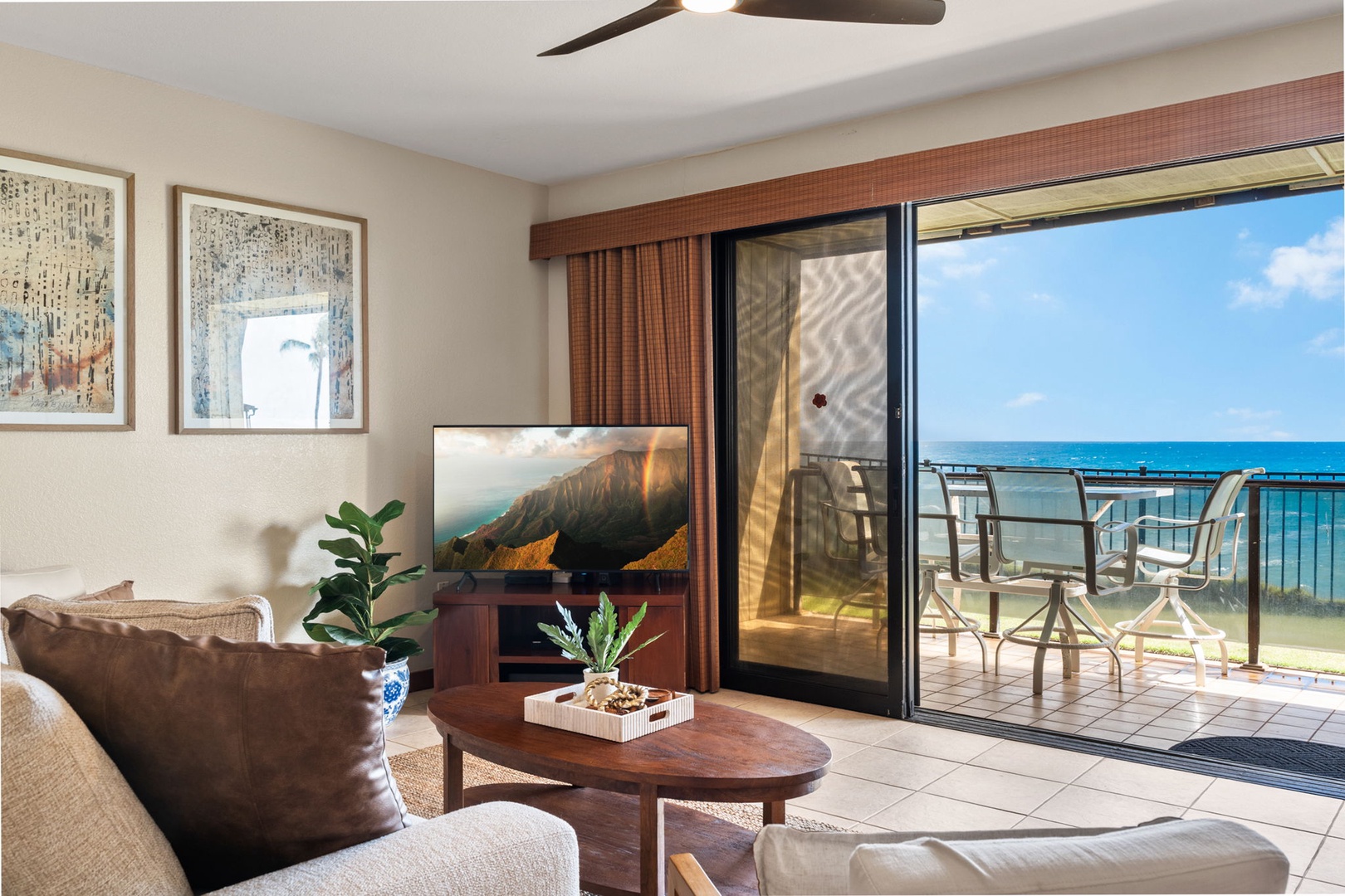 Relax in your airy living room where stunning ocean views greet you through sliding doors. Step out to your private balcony and feel the sea breeze.