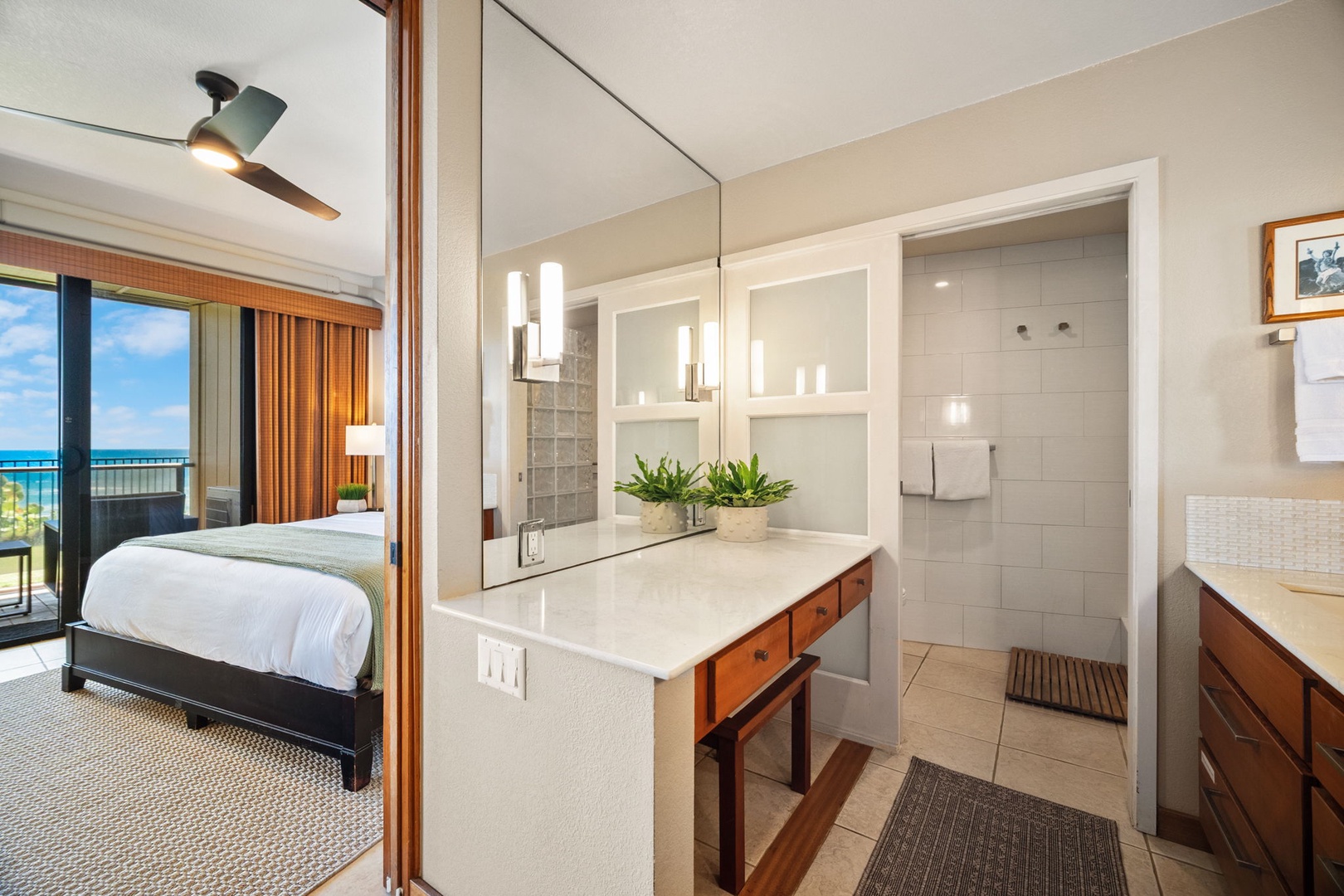 Unwind in your coastal retreat where crisp linens meet ocean breezes. Your private sanctuary features a spa-inspired ensuite and balcony overlooking turquoise waters—comfort and serenity await you here.