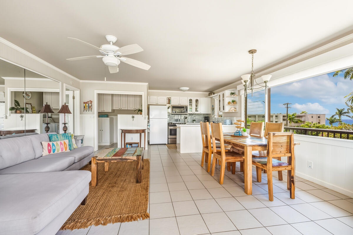Relax in your bright, open-concept living space where tropical breezes flow through and distant ocean views create the perfect Hawaiian retreat.