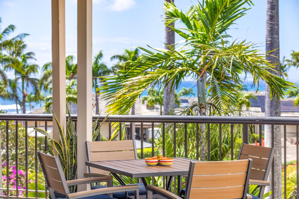 Sip your morning coffee surrounded by swaying palms and tropical views from your private balcony table.