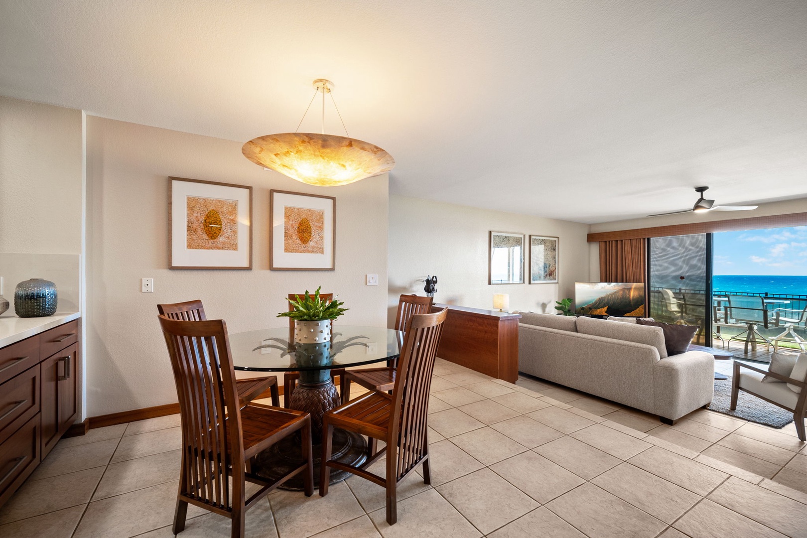 Unwind in your open-concept living space where natural light pours in from the ocean-facing balcony. The dining area and lounge blend seamlessly for easy gatherings and relaxation.