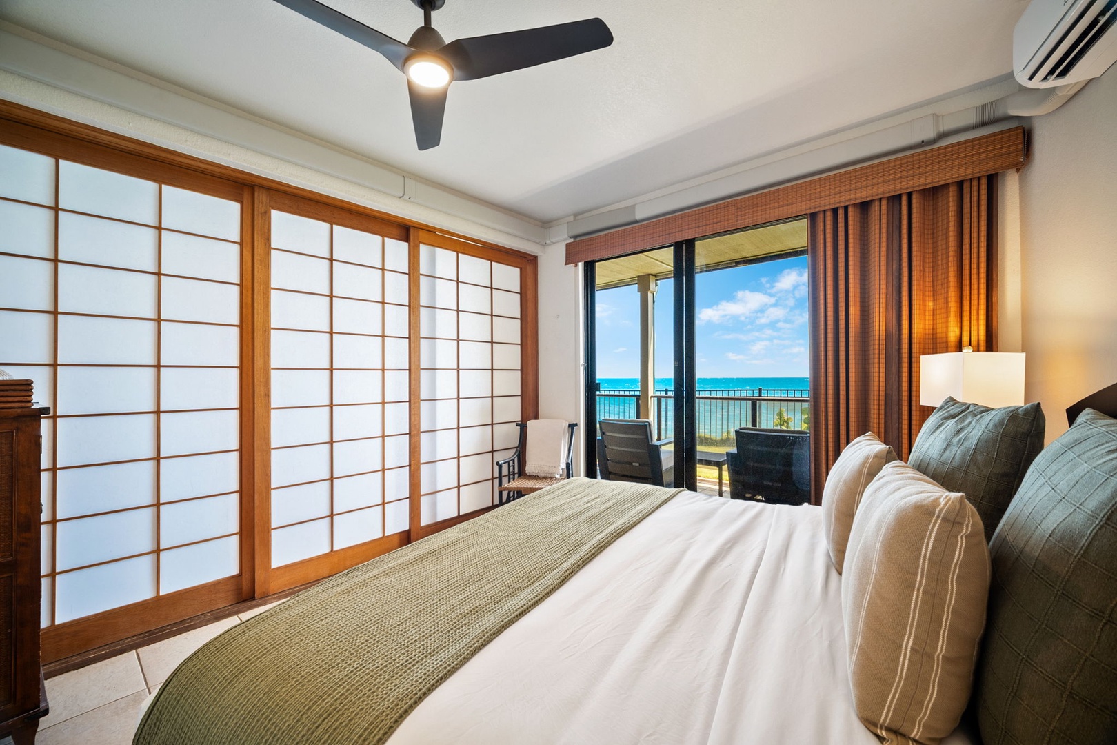 Wake up to breathtaking ocean views from your private balcony. Soft linens, calming décor, and gentle ceiling fan breezes create your perfect seaside retreat.
