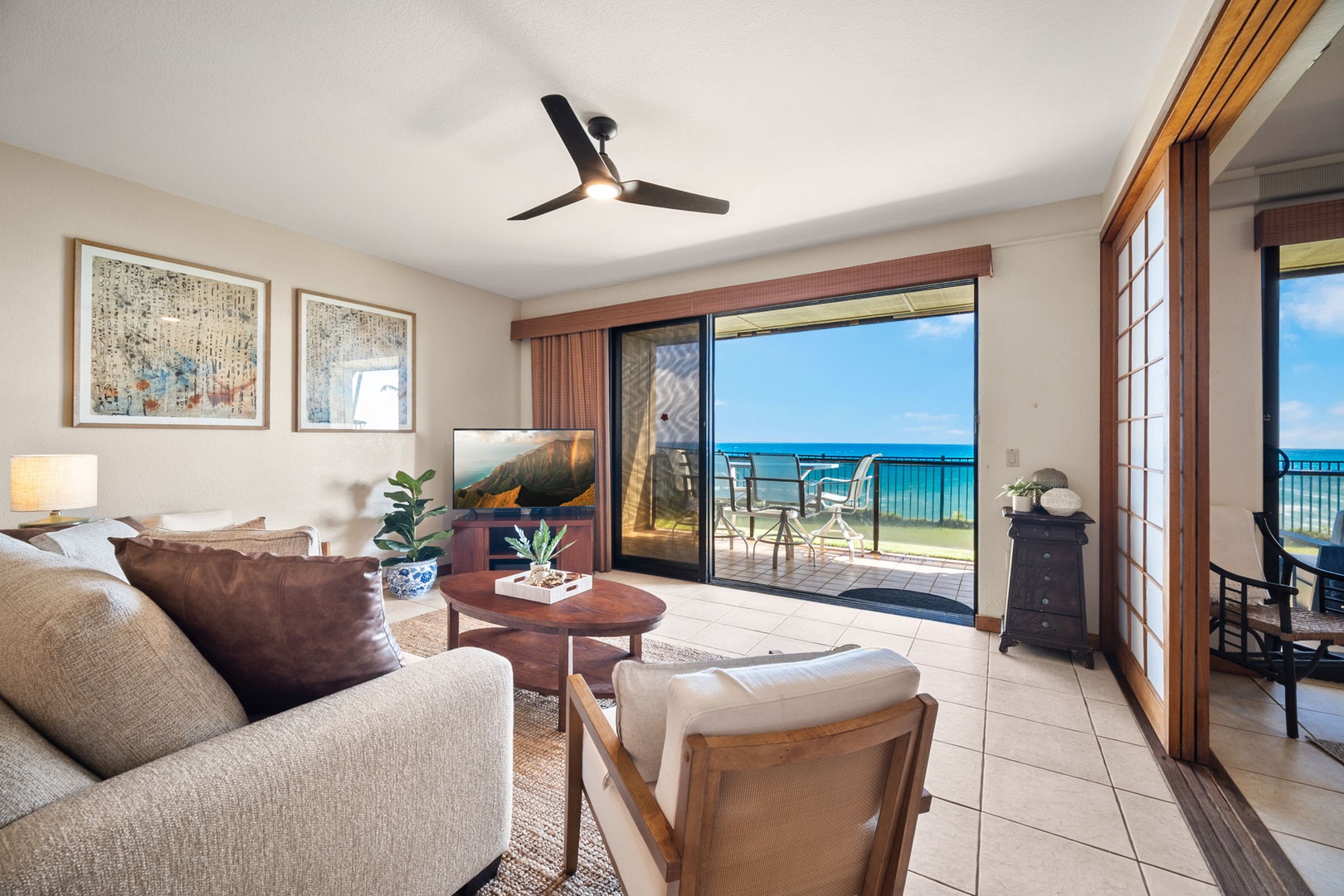 Settle into your serene living space with expansive ocean views right from the comfort of your sofa—the perfect spot to unwind and soak in the coastal beauty.