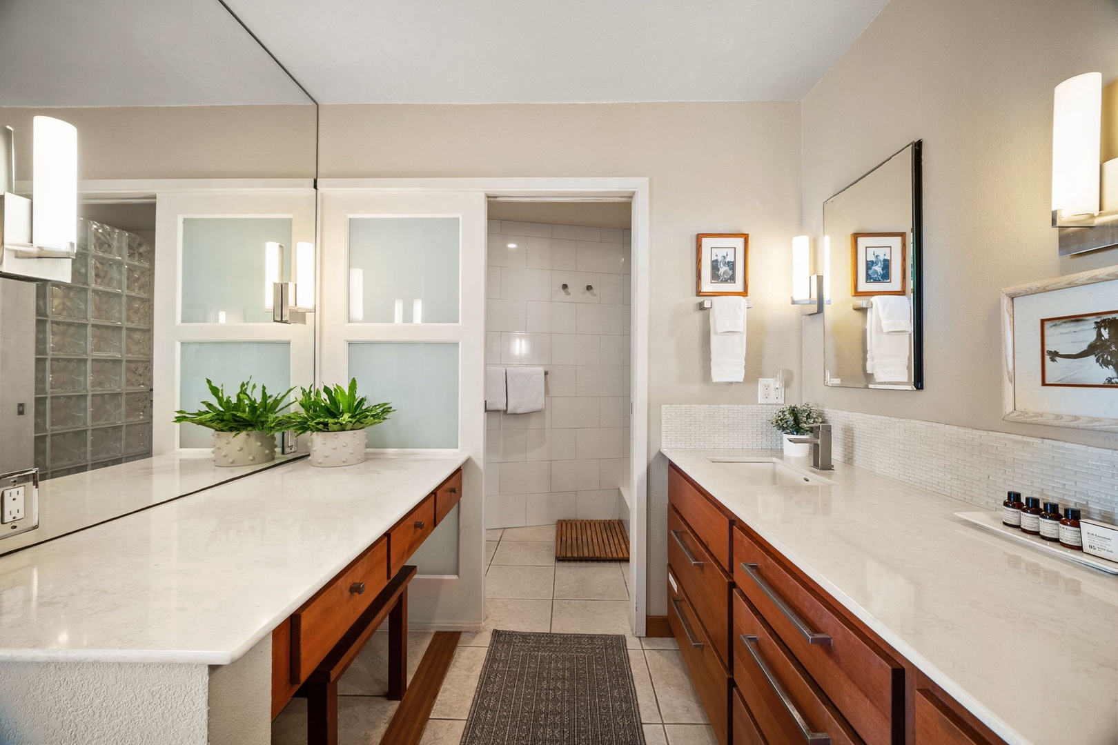 Step into your serene spa-inspired retreat with dual vanities, gleaming countertops, and a tranquil palette that invites you to unwind after each adventure-filled day.
