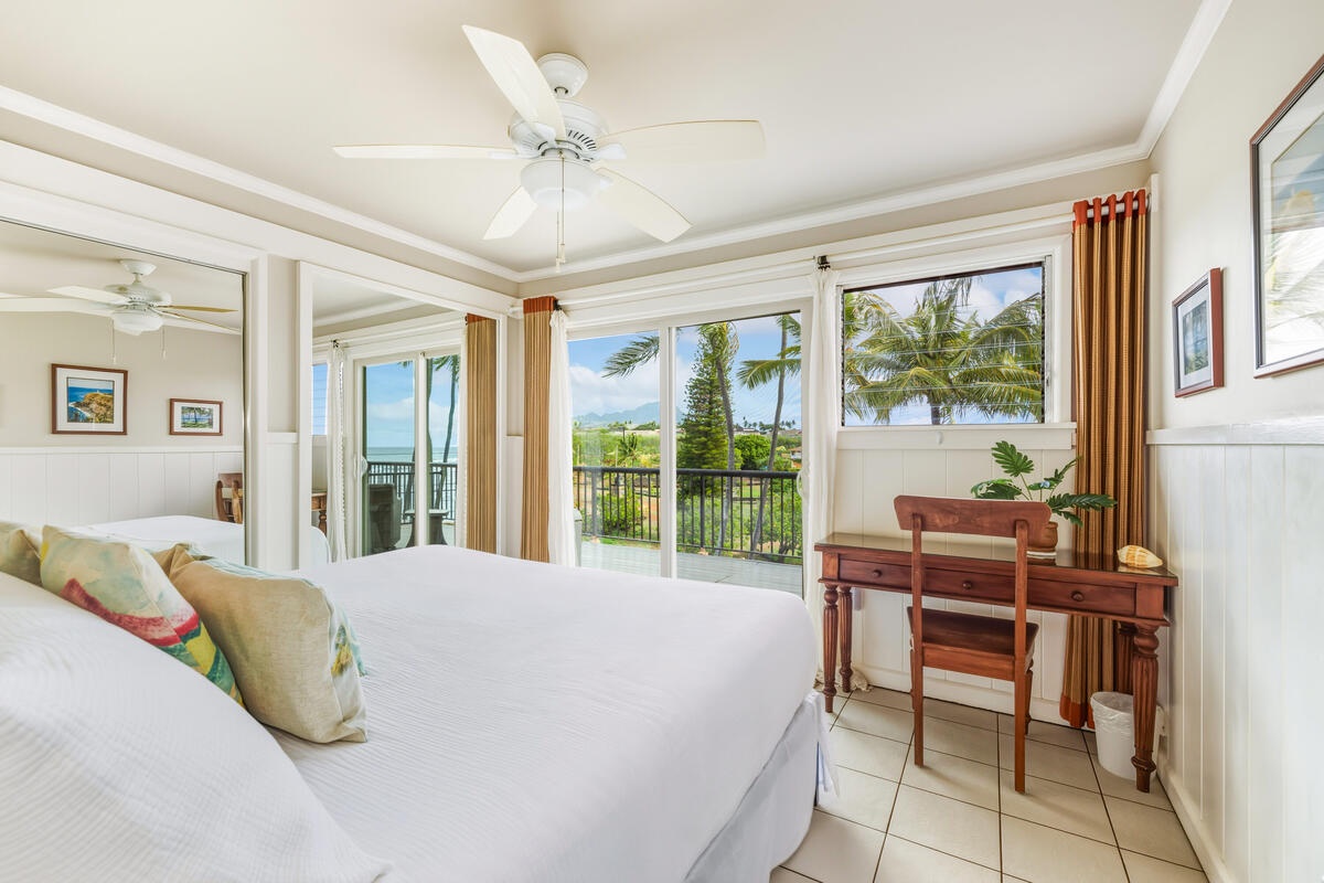 Wake up to tropical paradise with swaying palms framed in your bedroom windows, where gentle breezes flow through.