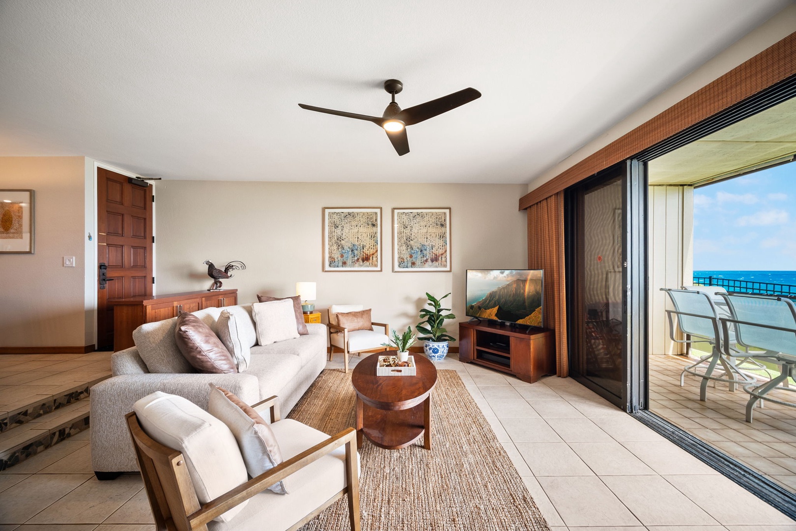 Unwind in your inviting living space where soft furnishings, ocean breezes, and serene coastal style create the perfect atmosphere for relaxation and memorable evenings together.
