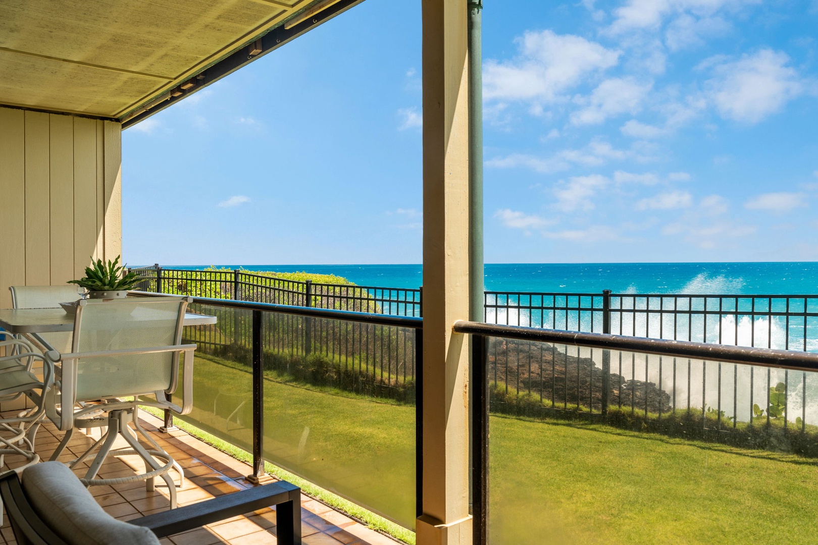 Step onto your private balcony and soak in stunning turquoise waters meeting endless blue skies. Relax on comfortable seating with tropical breezes and ocean views at your fingertips.