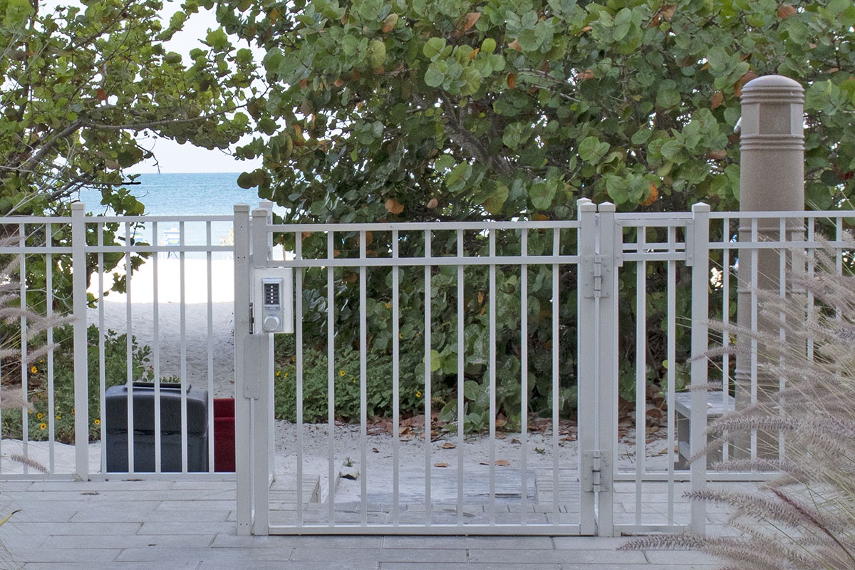 Secured gate to and from the beach.