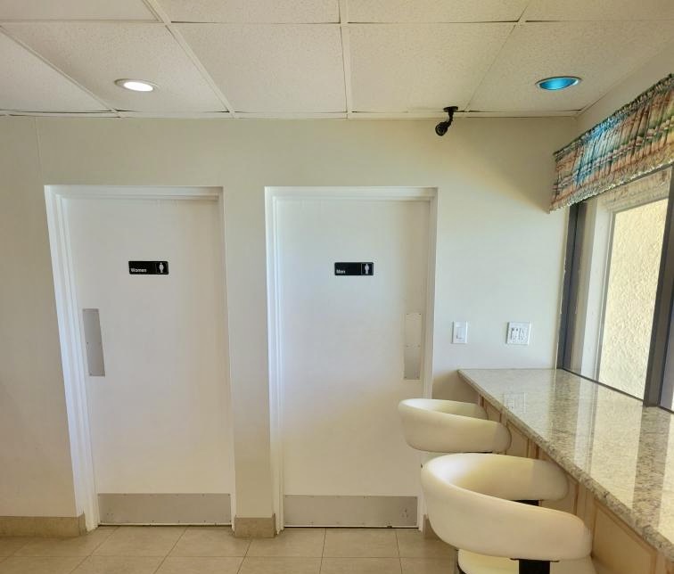 Community room has bathrooms for pool area
