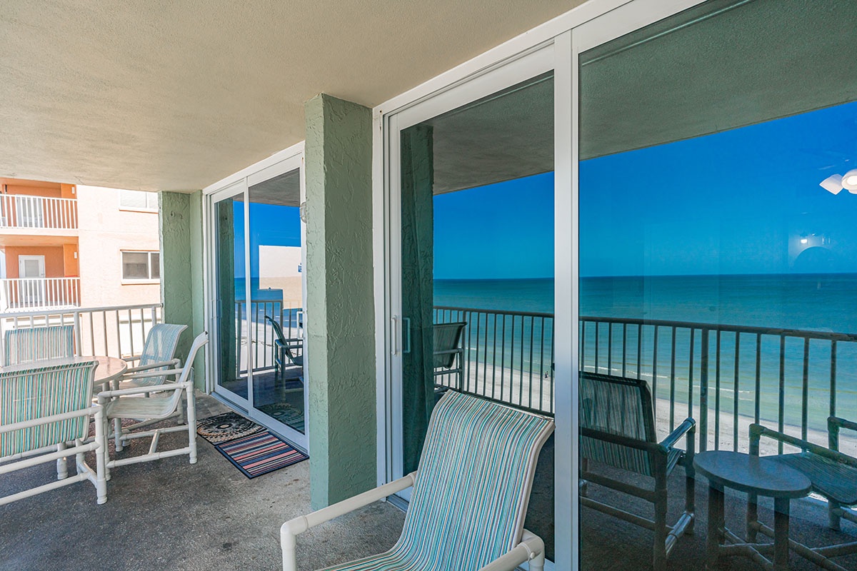 Your private balcony offers stunning direct sea views - perfect for morning coffee or sunset relaxation with comfortable seating.