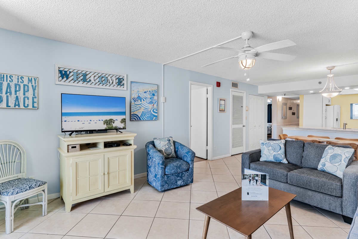 Settle into your coastal retreat with airy blue tones, comfy seating, and beach-inspired décor creating a cheerful, welcoming vibe that invites you to kick back and relax after a day by the shore.