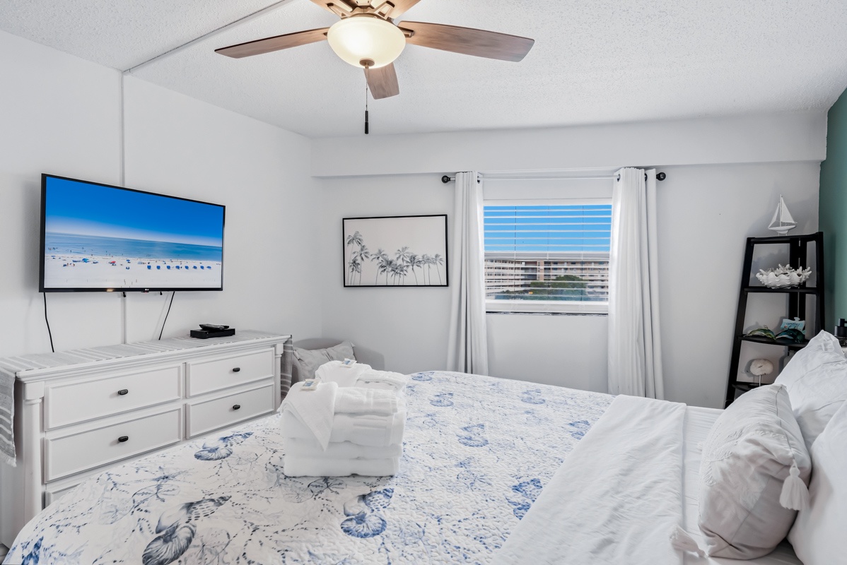 Primary King bed with ceiling fan