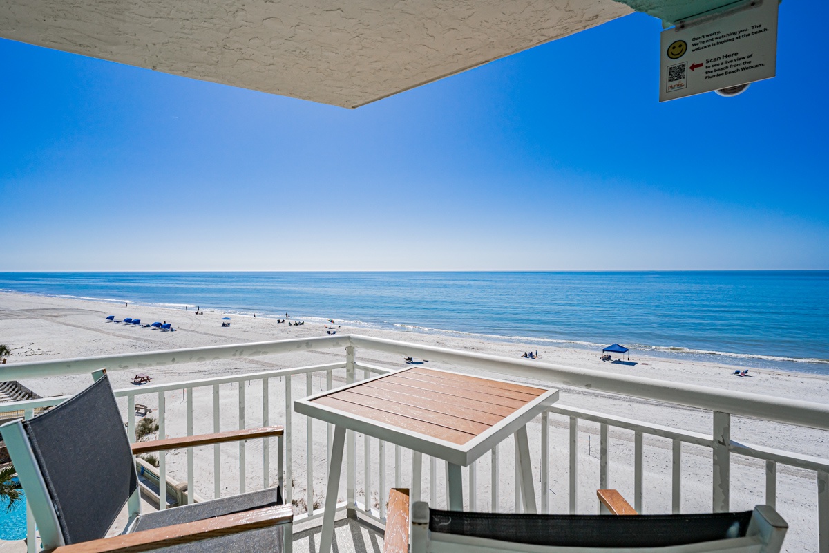 Your private balcony offers stunning ocean views and direct beach access for endless relaxation.