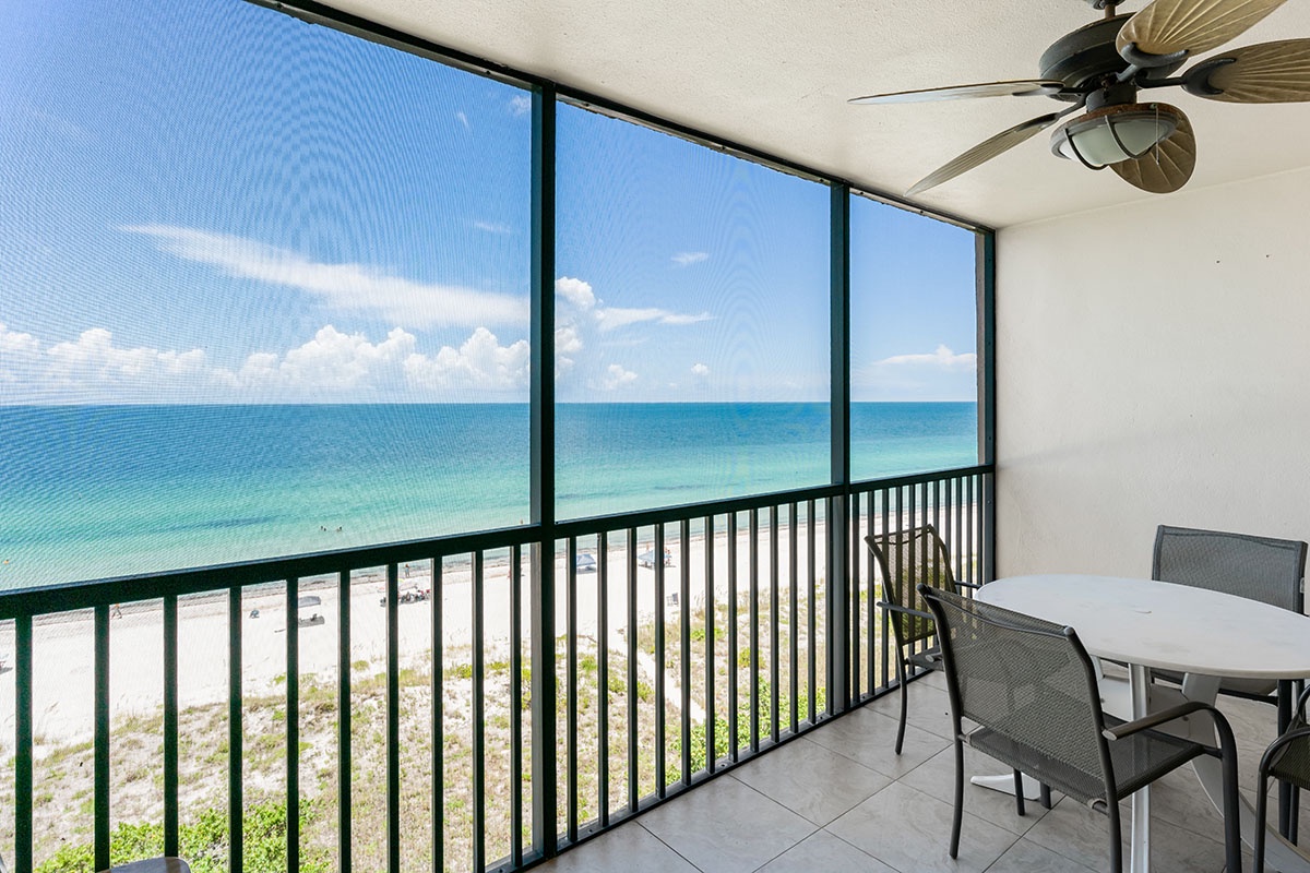 Sip your morning coffee at your private oceanfront table while the ceiling fan keeps you cool and endless sea views stretch before you.