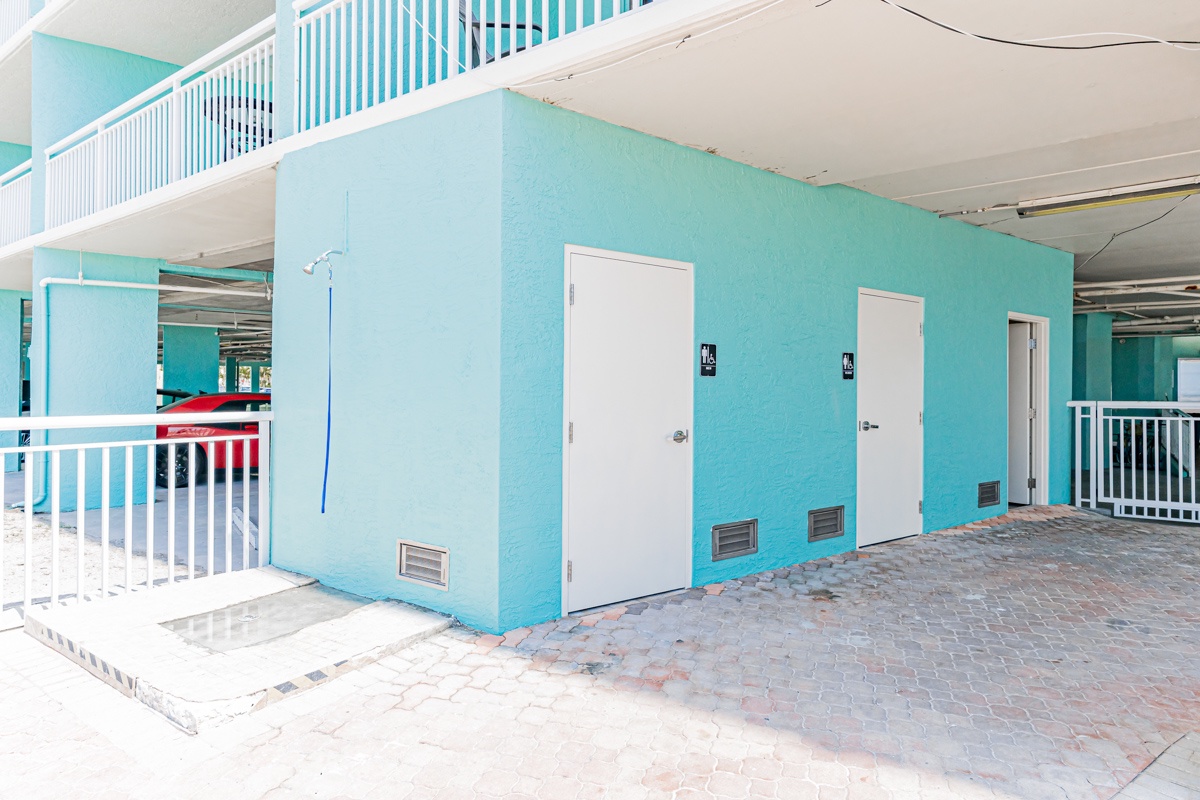 Outdoor bathrooms and shower poolside