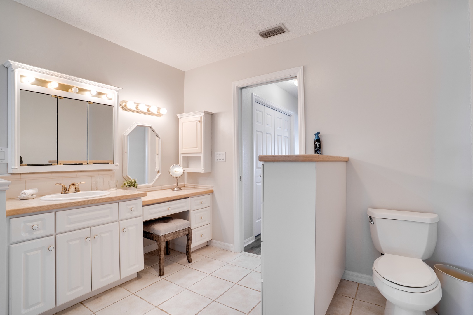 Your spacious master bathroom offers elegant double vanities, perfect lighting for morning routines, and a private water closet for ultimate convenience.
