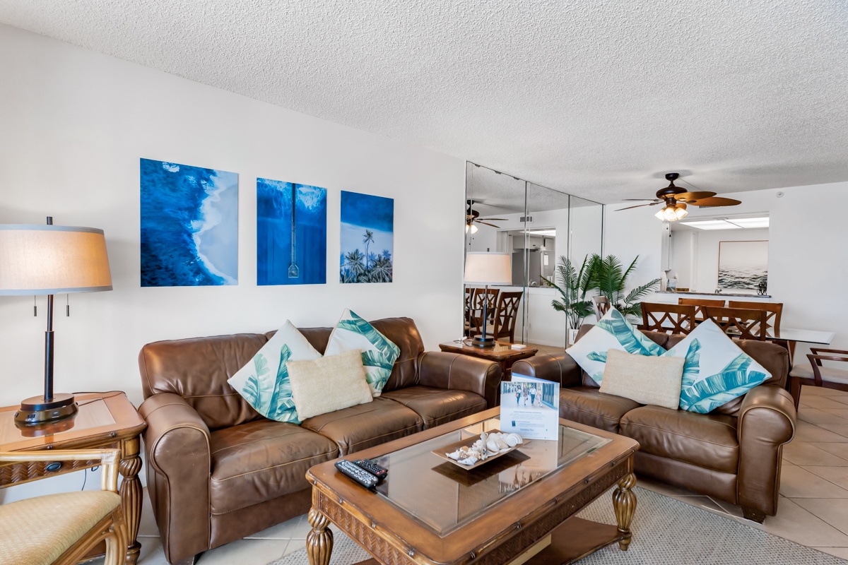 Sink into plush leather sofas and unwind in your breezy coastal retreat. The open layout flows effortlessly from lounge to dining, inviting you to make yourself at home.