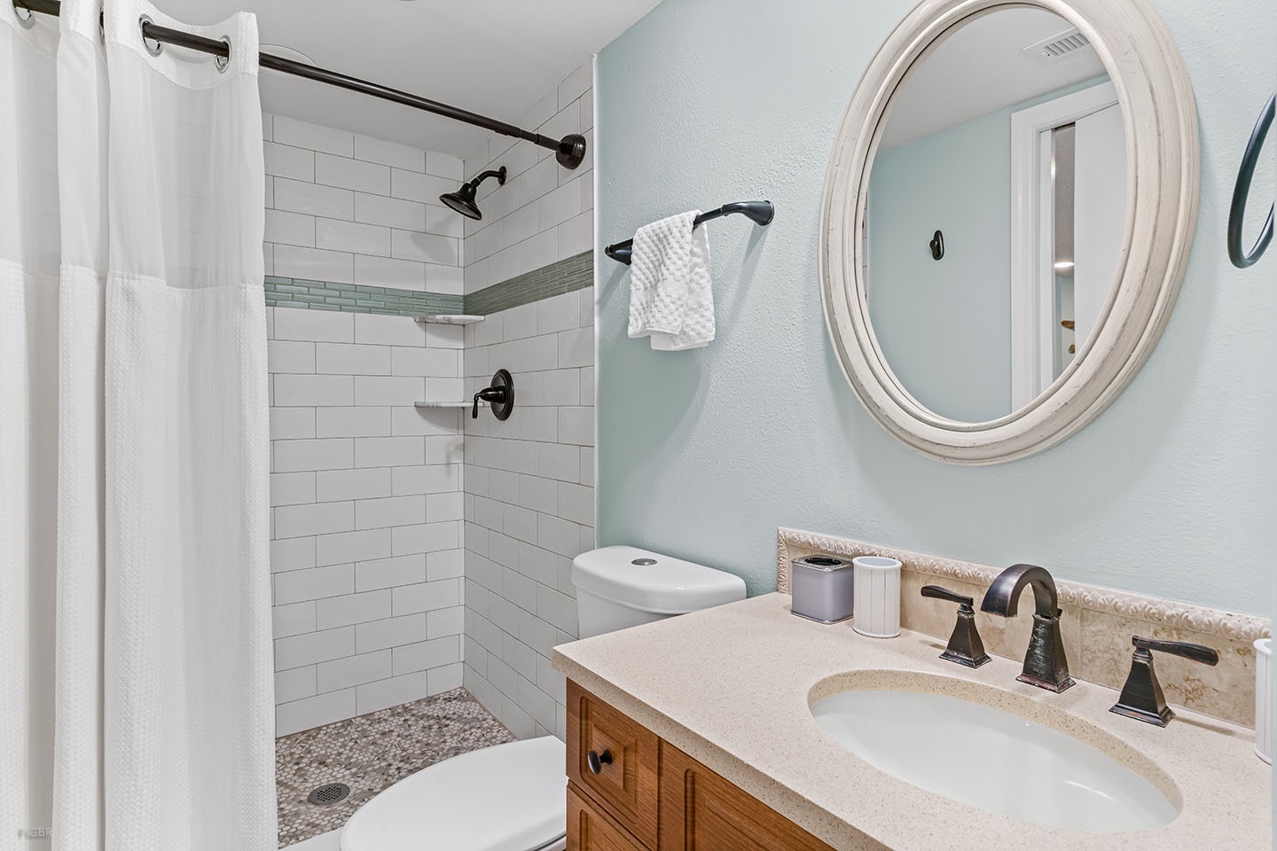 The Hallway Bathroom has a step-in shower.