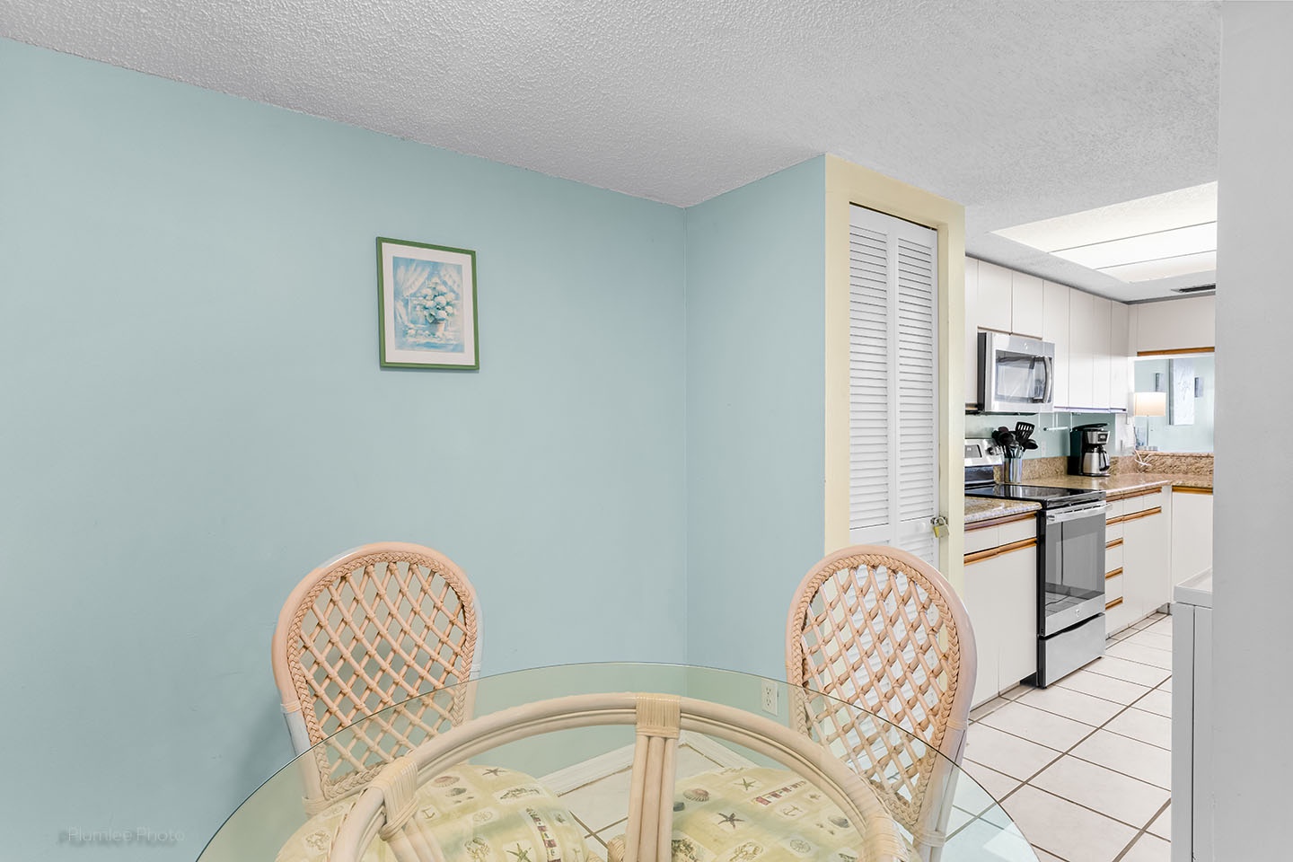 The breakfast nook is next to the kitchen.