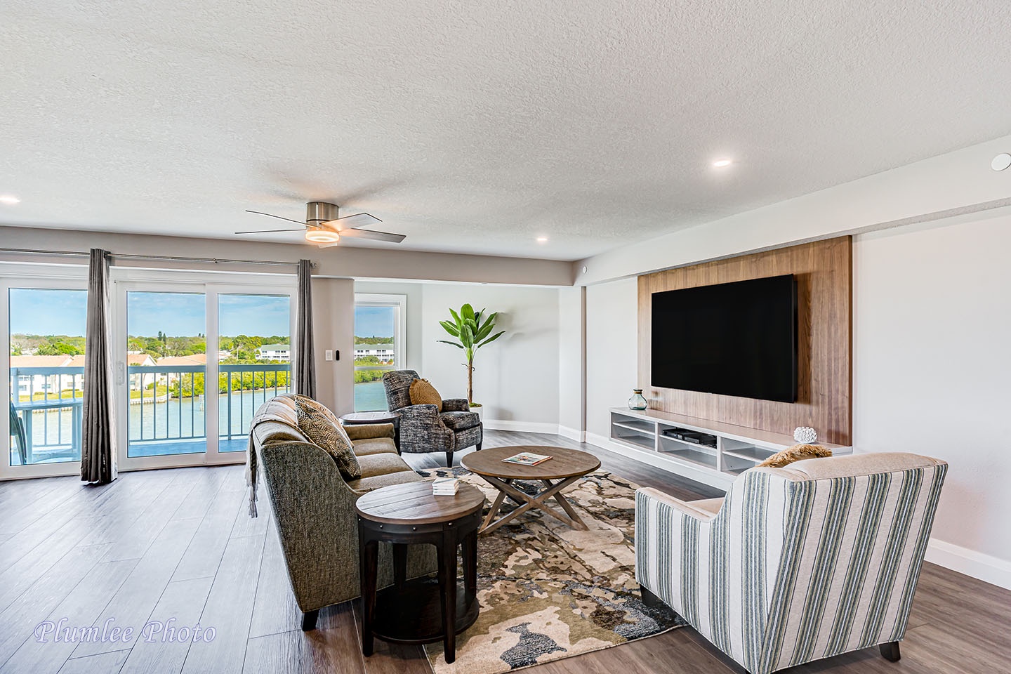 Living Room has two sets of sliders to balcony.