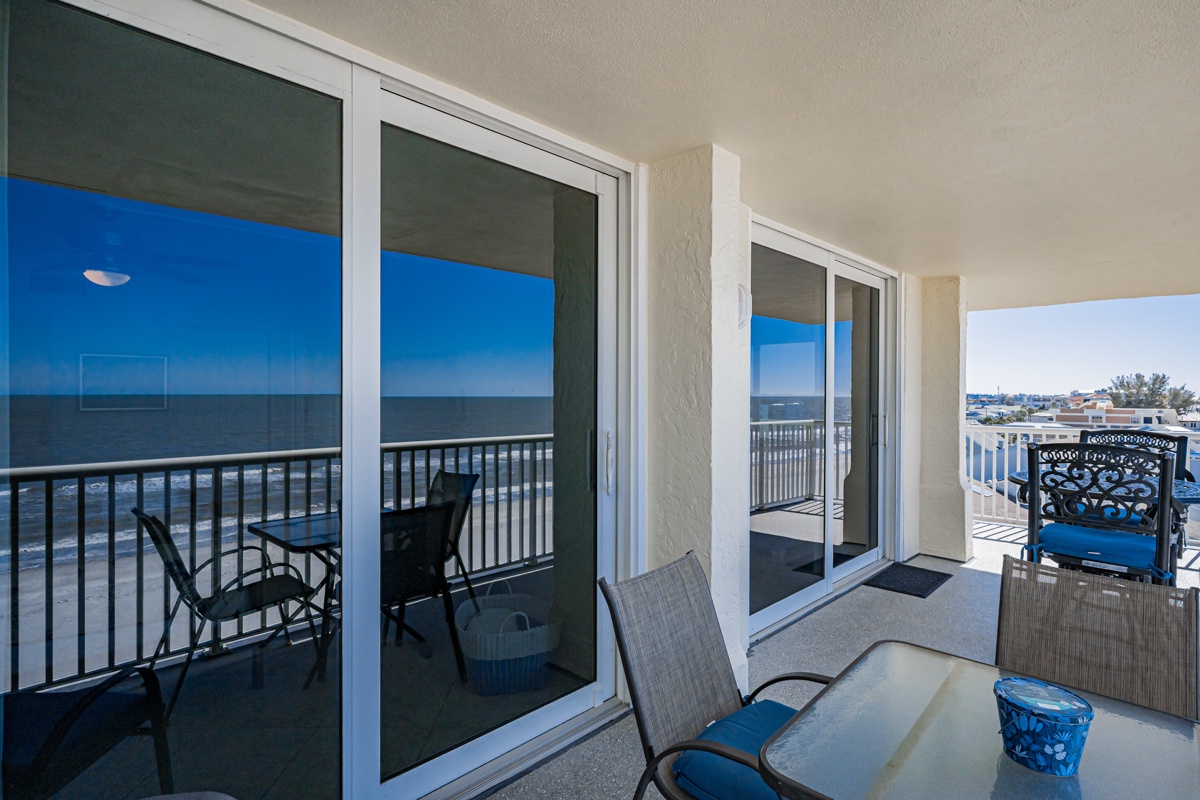 Your private balcony offers stunning oceanfront views where you can sip morning coffee while watching waves roll in below.