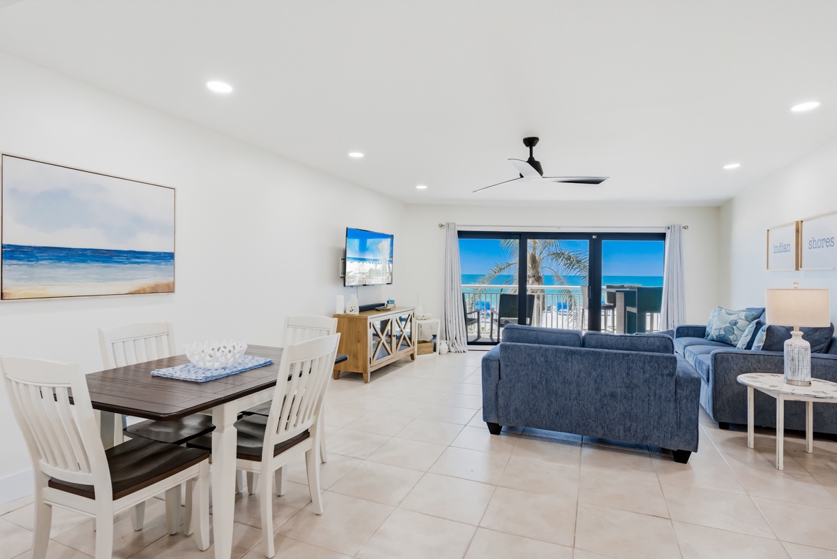 Your bright open-plan space combines dining and living areas with stunning ocean views from your private balcony.
