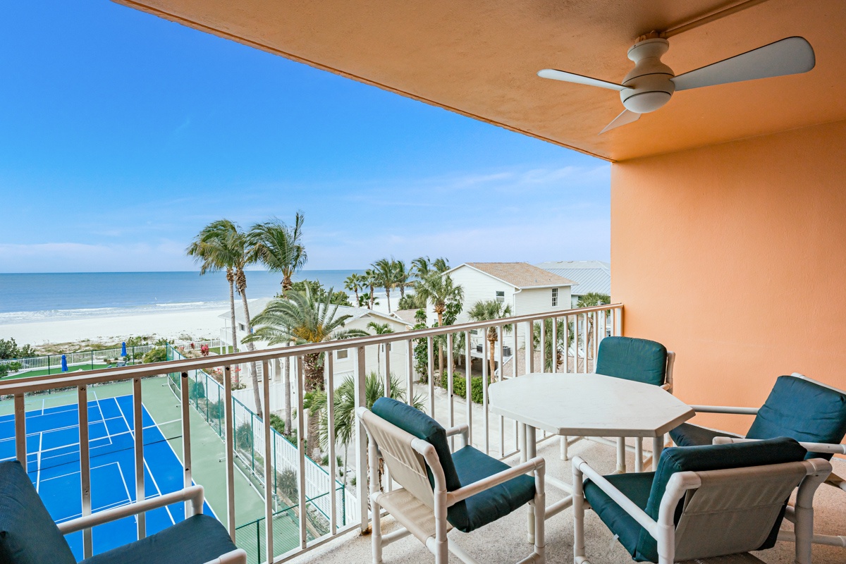 Relax on your private balcony with stunning sea views, where ocean breezes and palm trees create the perfect tropical escape.