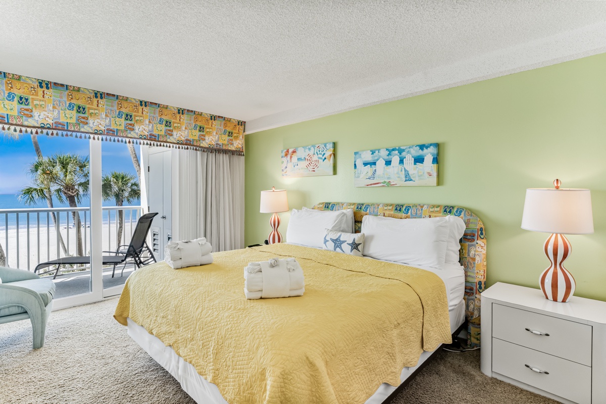Wake up to ocean breezes and swaying palms right from your king bed. Sunny coastal colors and a private balcony let you savor every moment of your beachfront escape.