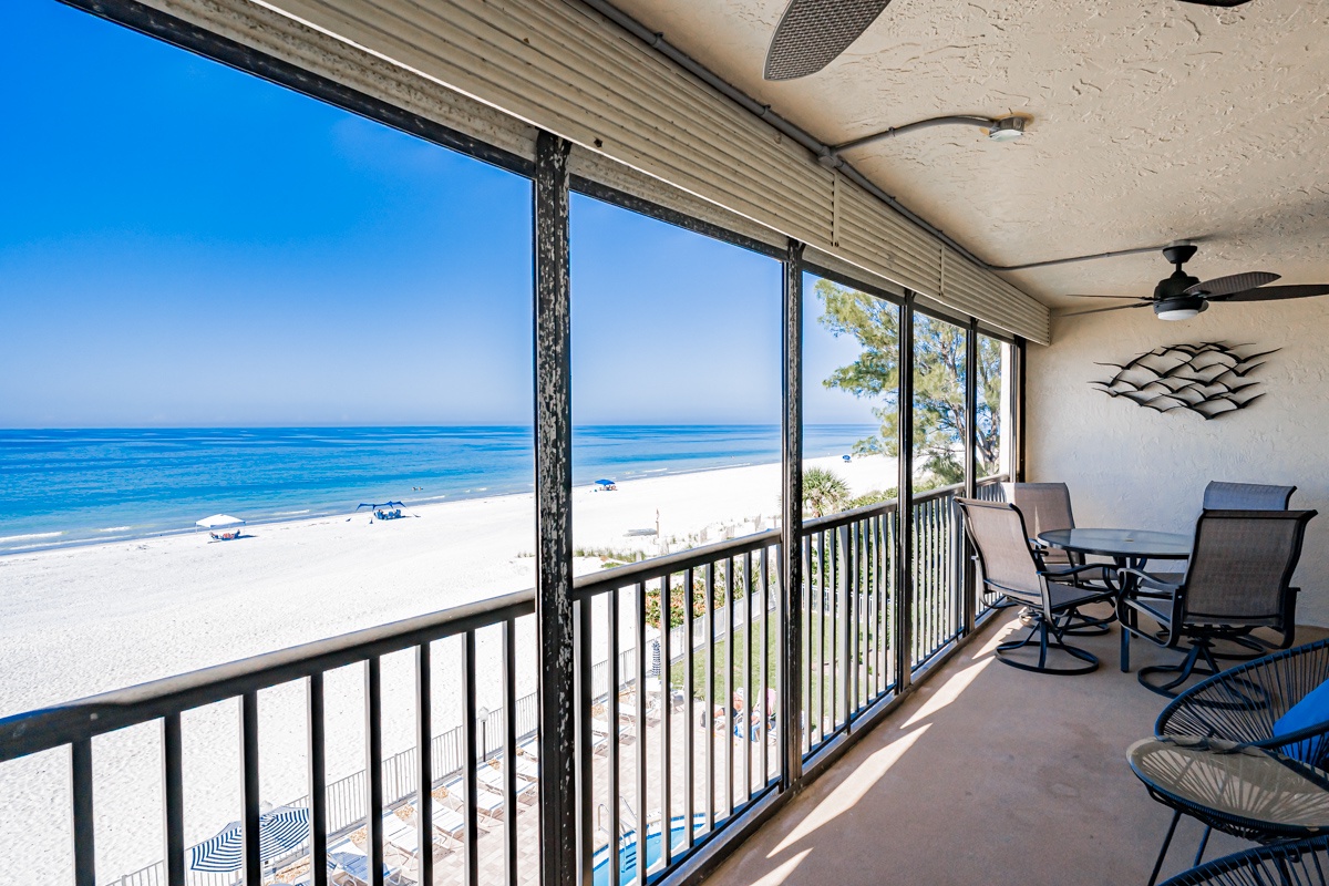 Wake up to your own private beachfront paradise. Sip your morning coffee on the screened balcony as waves lap the shore just steps away—your perfect retreat to unwind and soak in endless ocean views.