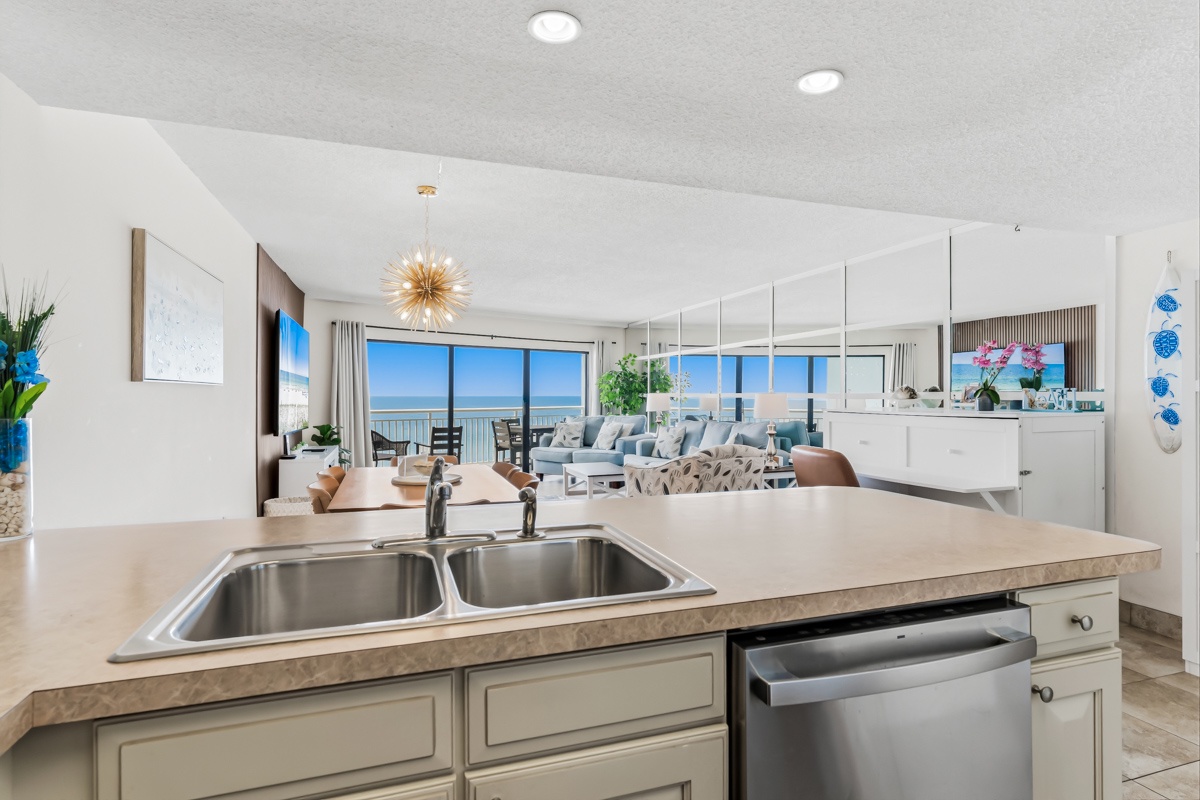 Stunning ocean views frame this bright, open living space where you can cook, relax, and soak in the coastal beauty all at once. Every window opens to endless blue horizons.
