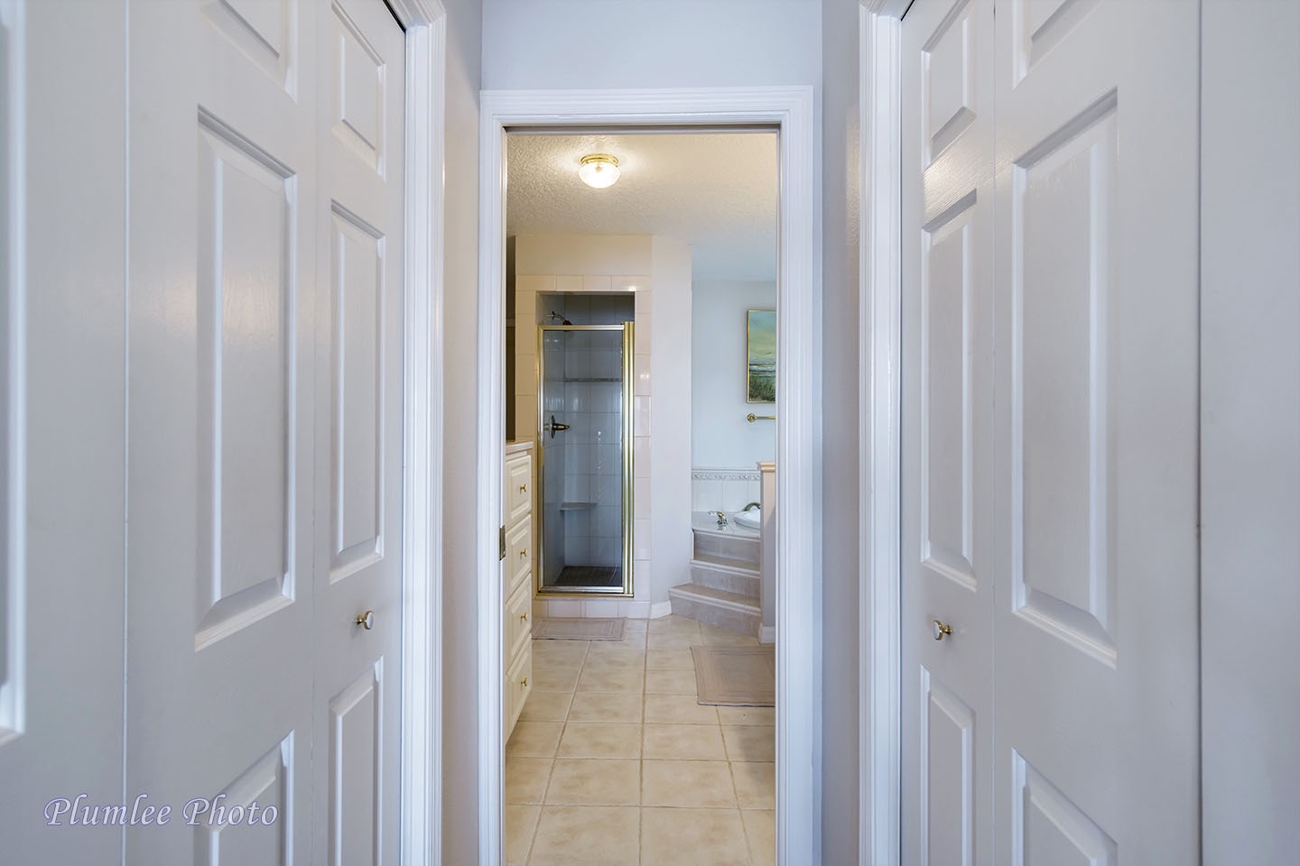 Plenty of closet space for the master bedroom along the way to the ensuite master bathroom.