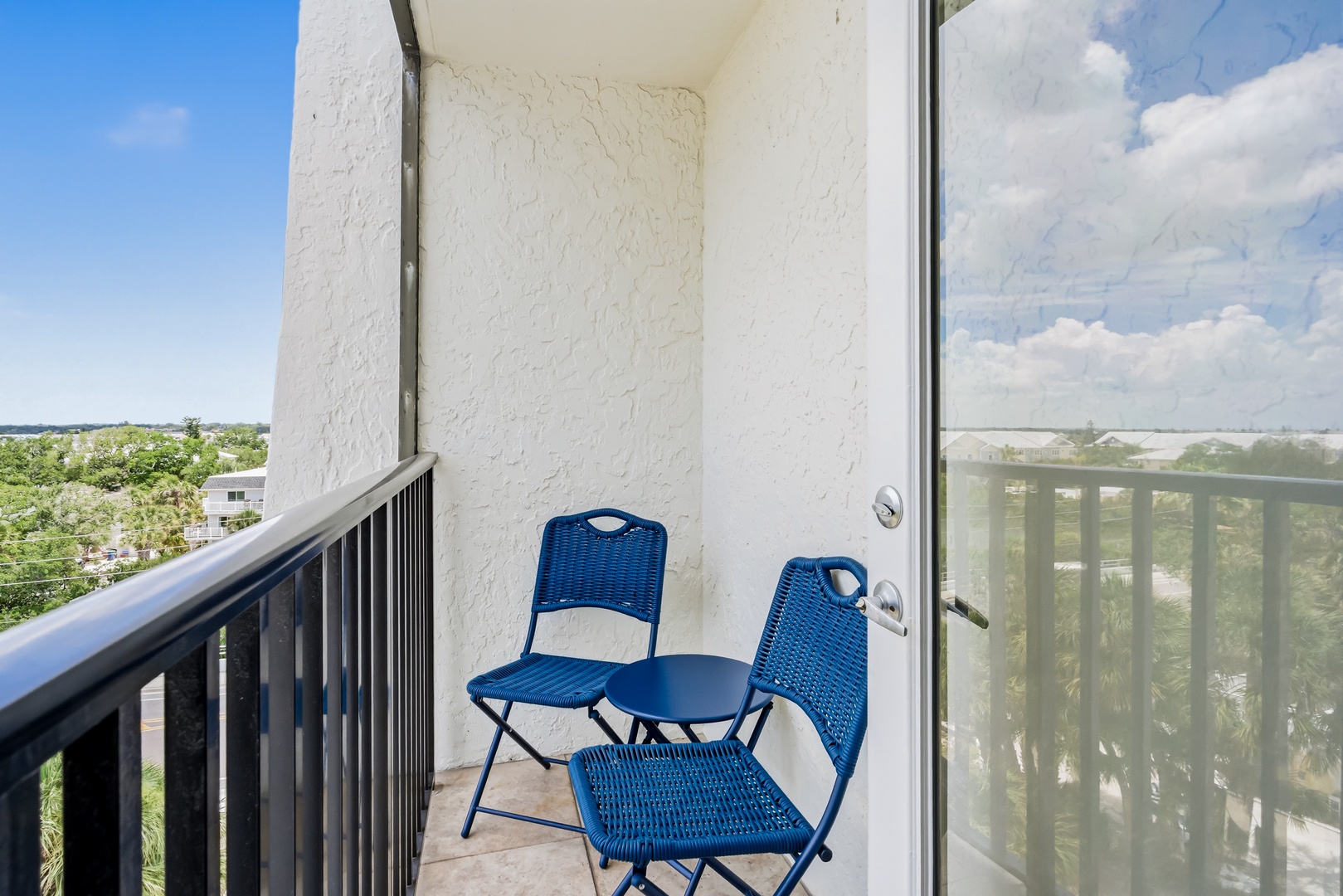 Private balcony with fresh air, blue skies, and peaceful treetop views—perfect for your morning coffee or evening unwind.