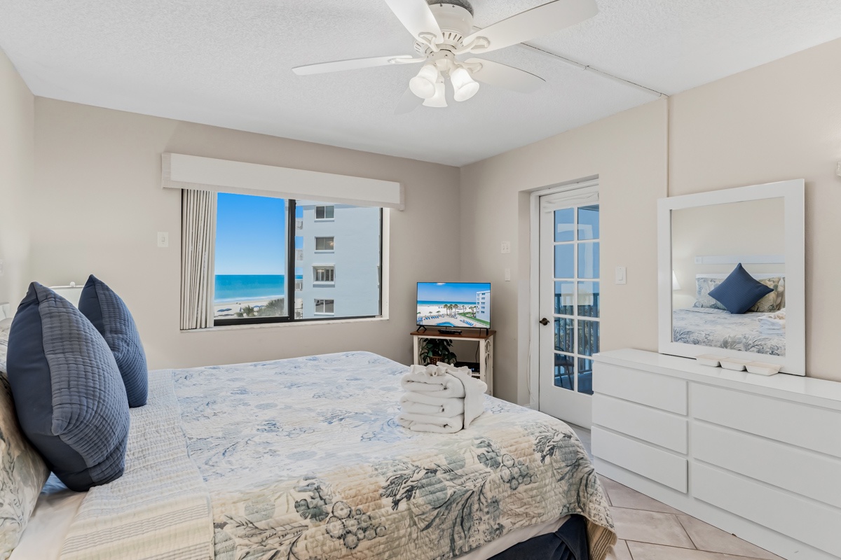 Wake up to the tranquil blues of the ocean framed perfectly through your bedroom window. This peaceful retreat offers a comfortable bed and coastal breezes, making your morning start as refreshing as the view itself.
