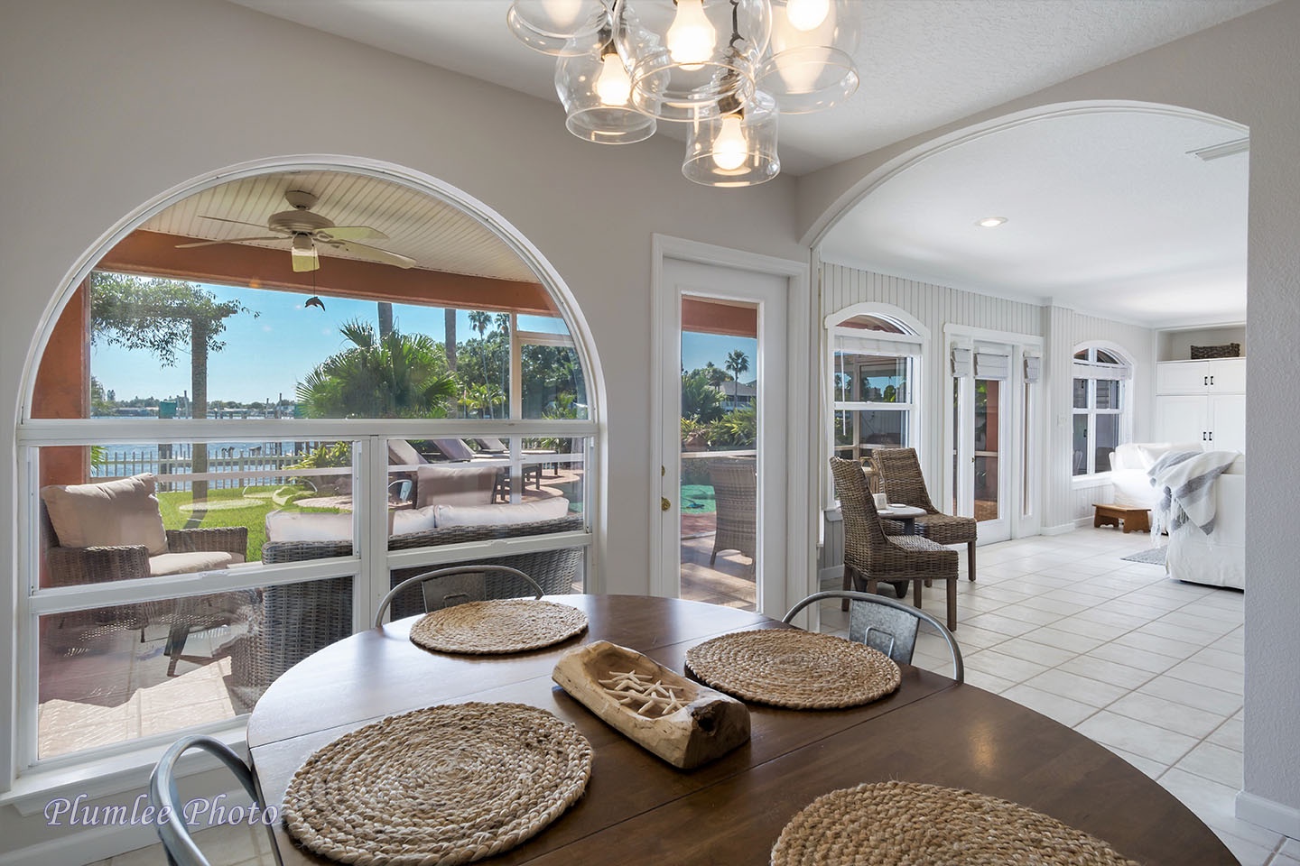 The kitchen dining table has a nice view of the backyard.