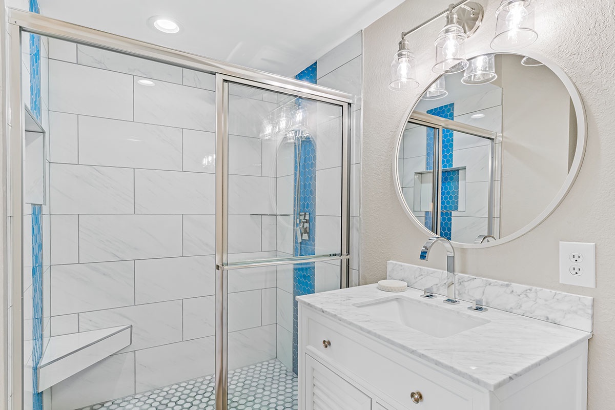 Primary ensuite bathroom with step-in shower
