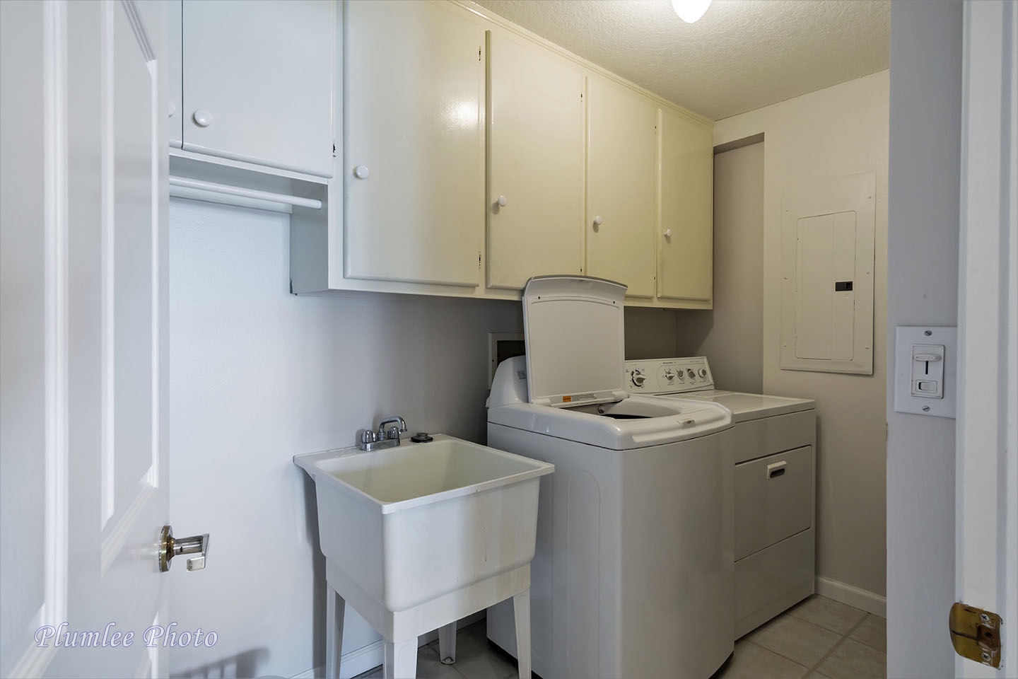 The laundry room is off the kitchen.