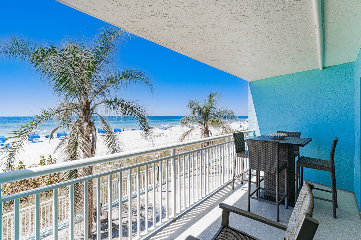 Your private beachfront balcony offers stunning ocean views, complete with comfortable seating where you can sip morning coffee while watching the waves.