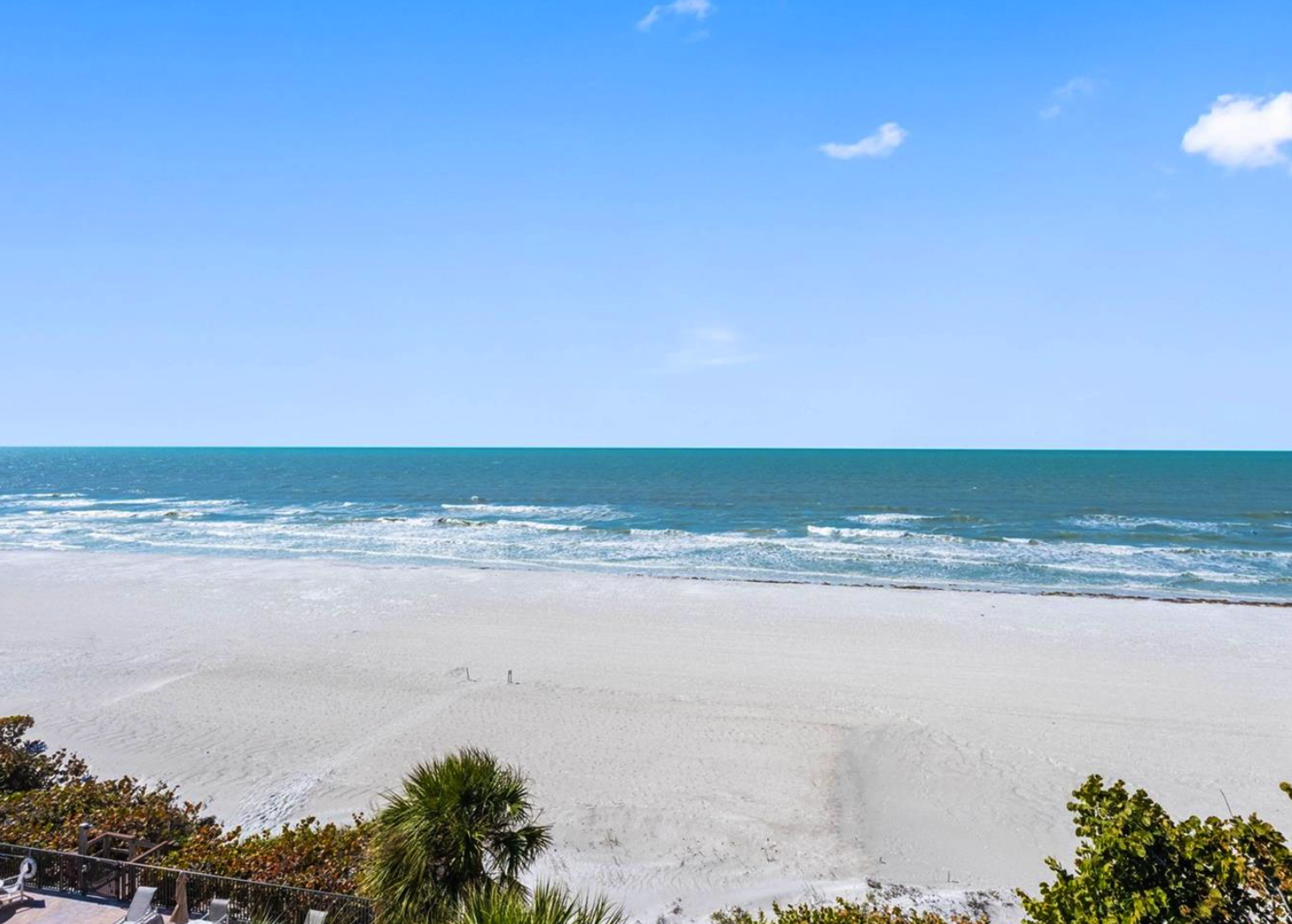 Stunning beachfront location with pristine white sand and turquoise waters. The property overlooks a serene stretch of coastline ideal for relaxing beach getaways.