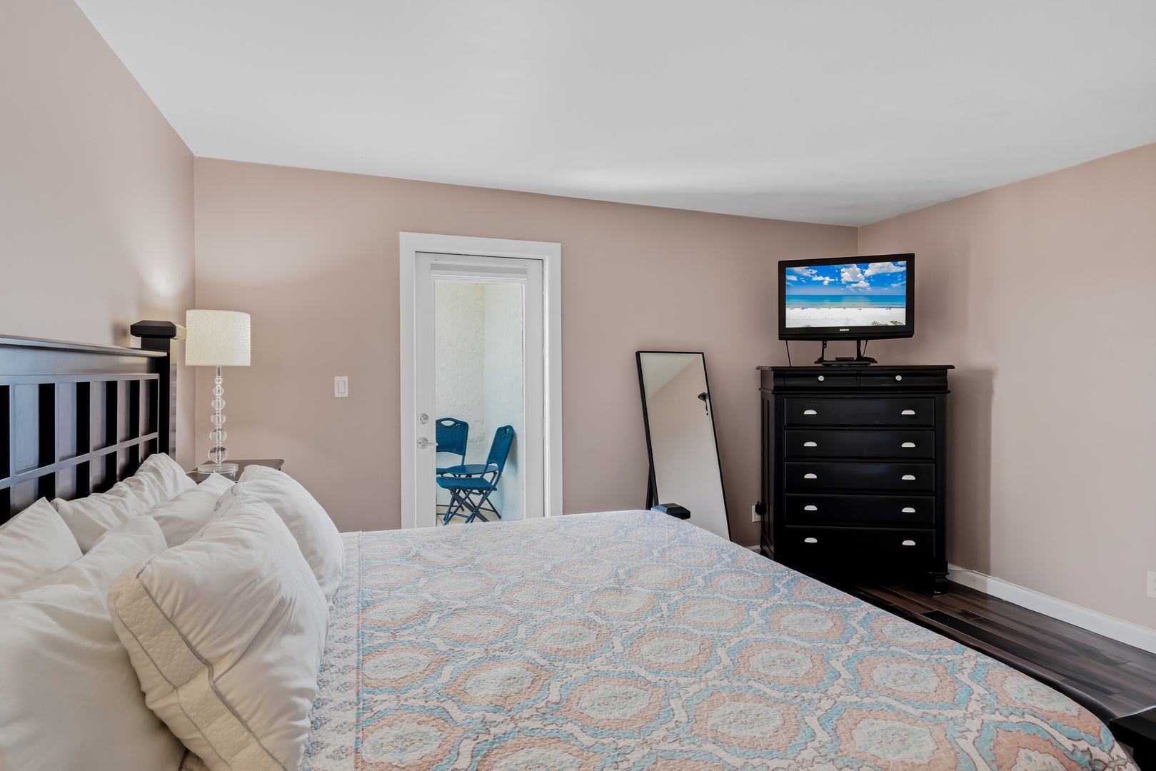 Sink into plush bedding and enjoy your favorite shows. This peaceful bedroom offers everything you need to unwind after a day of adventure.