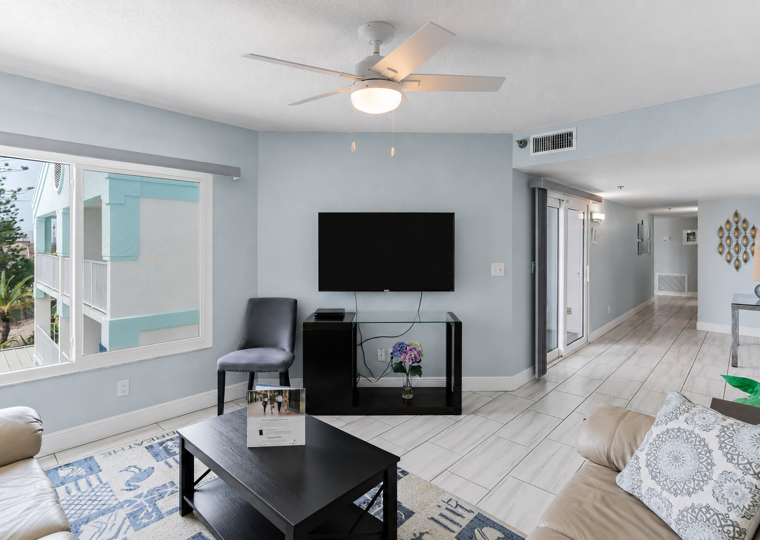 Two separate seating areas make this condo especially convenient for families or two couples.