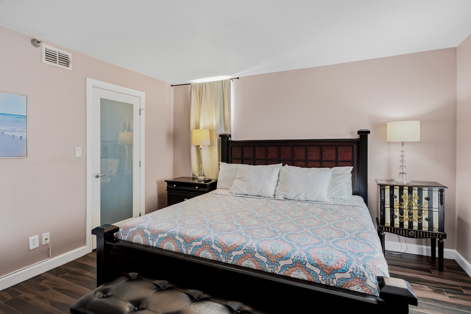 Sink into plush bedding and unwind in your tranquil bedroom, featuring elegant furnishings, soft lighting, and a private ensuite for your comfort.