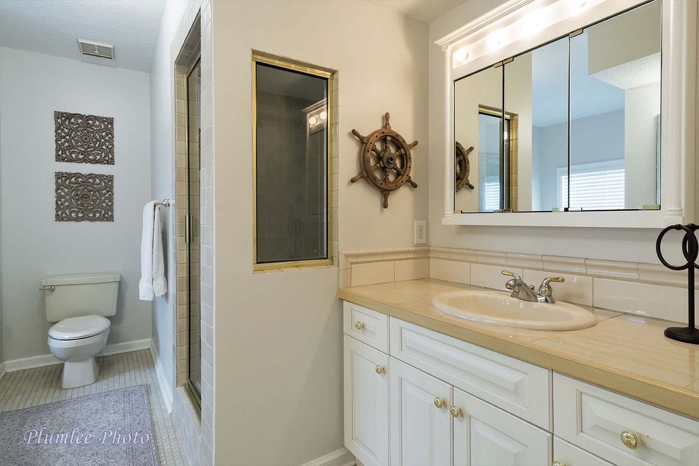 The shower and sink in the first floor family bathroom.