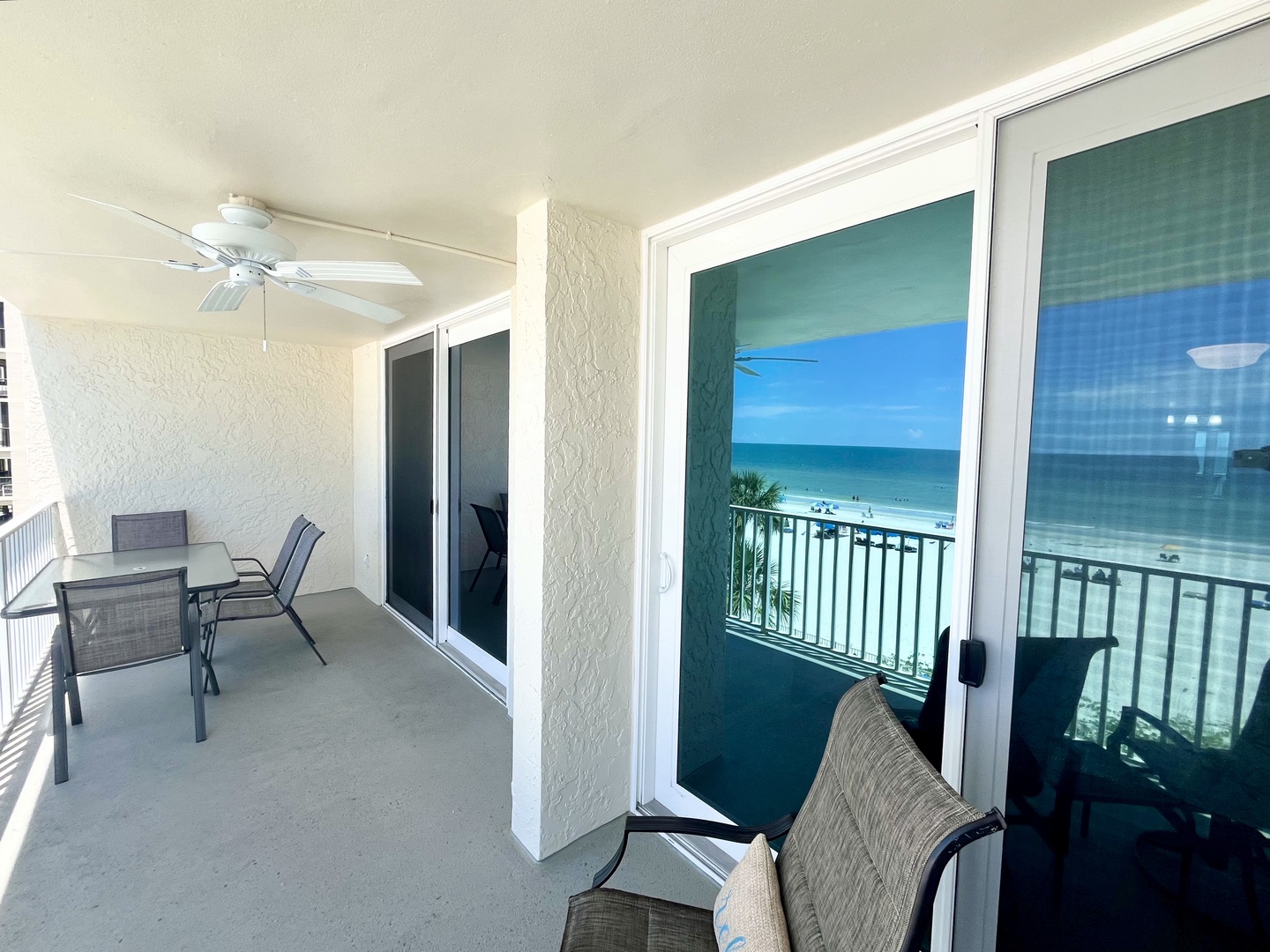 Sliders from living room and primary bedroom