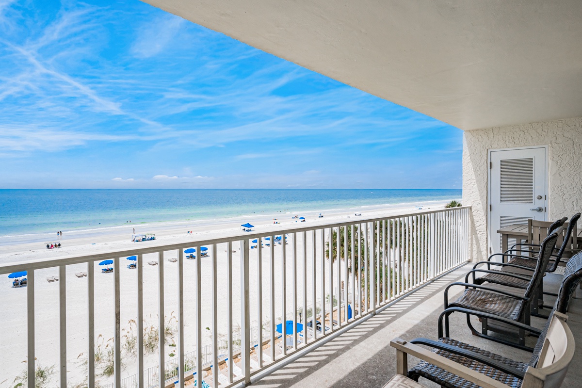 Pristine white sand and turquoise waters stretch out before you from your private balcony, where comfortable seating invites you to savor morning coffee or sunset cocktails with the Gulf breeze.