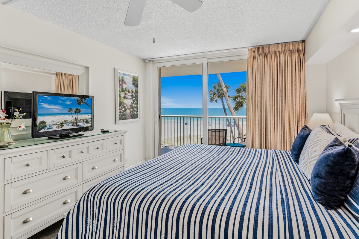 Wake up to sweeping ocean views framed by swaying palms, just steps from your private balcony. Your coastal King bed retreat invites you to unwind in comfort, with the beach as your backdrop.