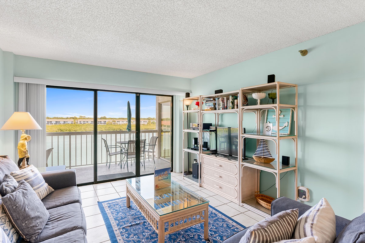 Unwind in your bright living space with comfortable seating and your private balcony overlooking scenic views.