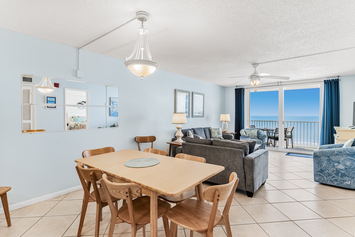 Picture yourself relaxing in this bright, coastal-inspired space where ocean breezes meet cozy comfort. Your open living and dining area flows seamlessly to a private balcony with stunning sea views—perfect for morning coffee or sunset cocktails.