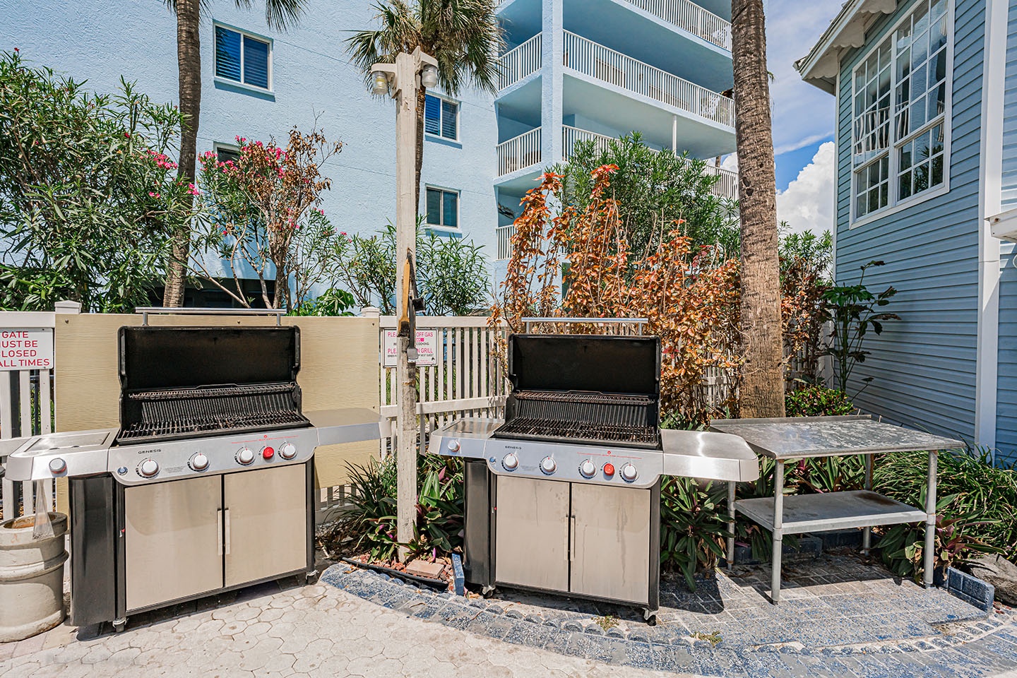 2 gas grills and table for your stuff