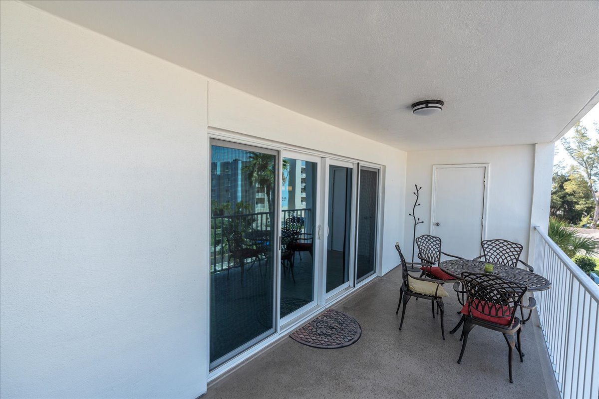 Step onto your private balcony where morning coffee or evening cocktails become special moments. The spacious terrace offers plenty of room to relax at the outdoor dining table while enjoying fresh air and peaceful surroundings.